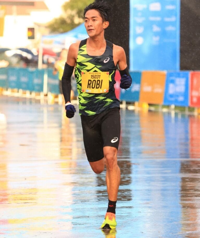 ASICS Indonesia Dukung Atlet Lari Robi Syianturi Pecahkan Rekor Nasional Half Marathon di Gold Coast Australia 2024