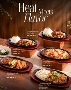 Sajian menu hot plate Heat Meets Flavor di B10 City Terrace Bar de Braga by ARTOTEL Bandung